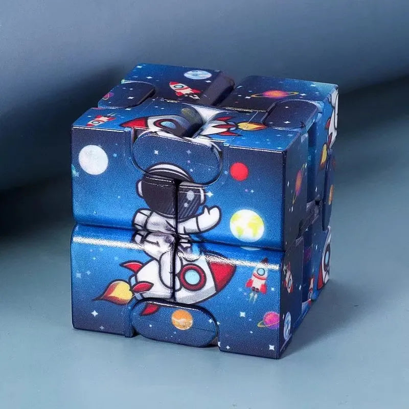 fidget cube toy with astronaut on rocket