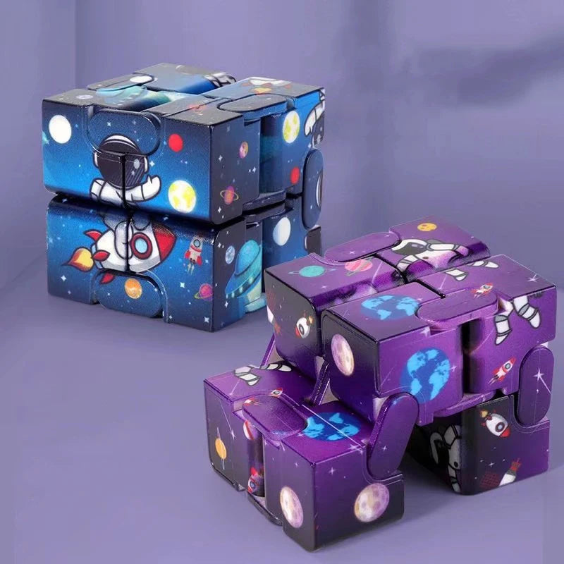 2 galaxy cube fidget cubes, purple and blue